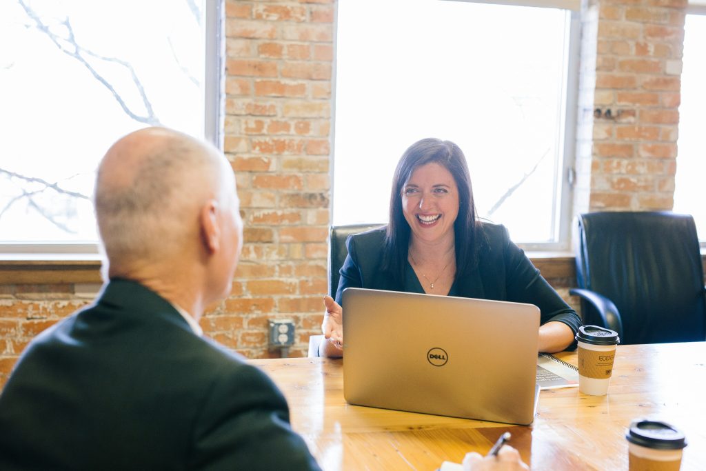 woman and man at office talking